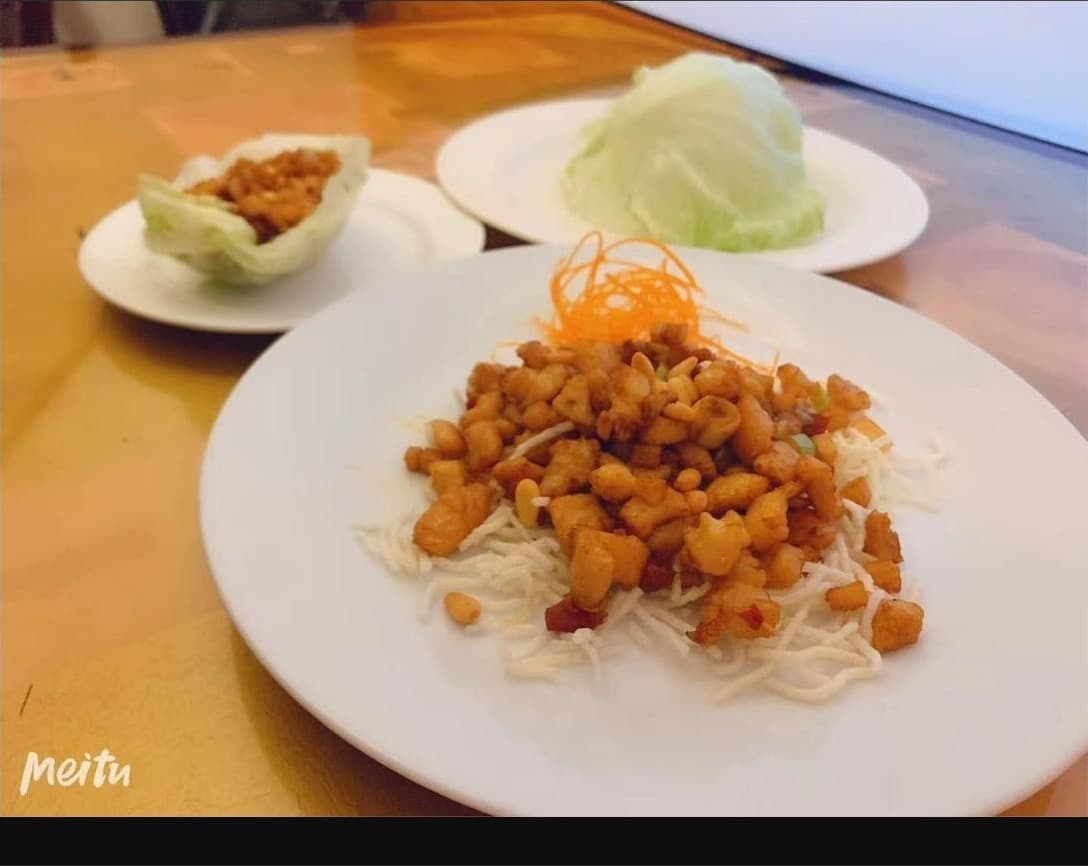 Signature lettuce wrap with shrimp, chicken, and sausage at Concerto Fusion Cuisine